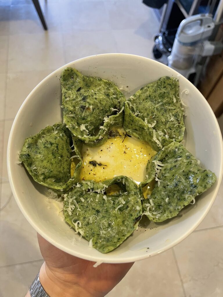 Sfoglia Verde Tortelloni with Caramelized Onion and Goat Cheese, finished in Brown Butter and Thyme Sfoglia Verde Tortelloni with Caramelized Onion and Goat Cheese, finished in Brown Butter and Thyme