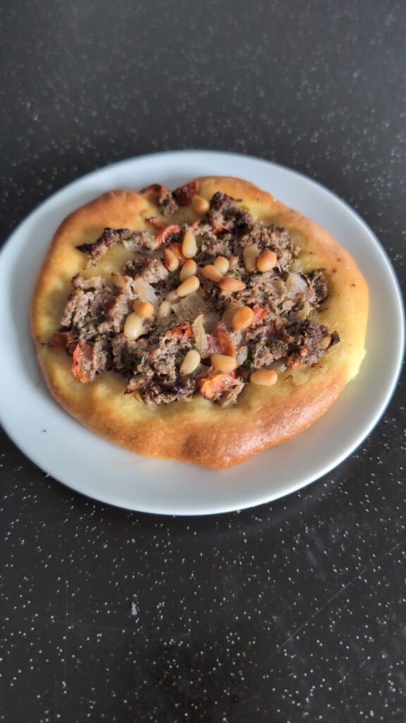 I made Palestinian sfihas.