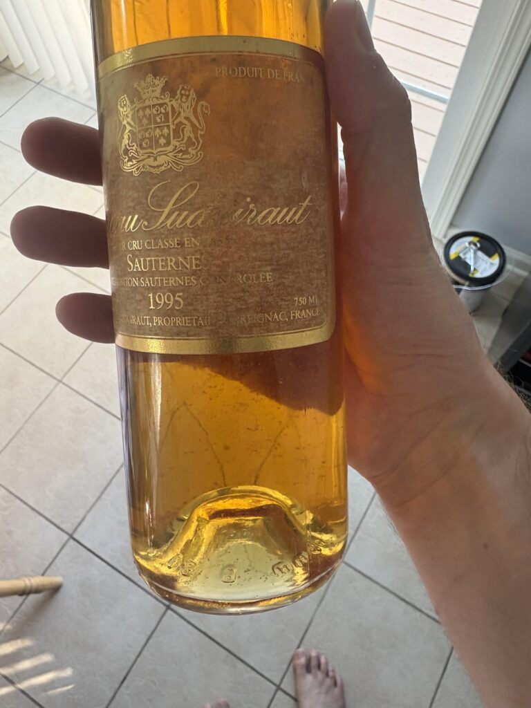Wife was gifted this 30 year old bottle of wine. Is it suppose to have this stuff floating in it?