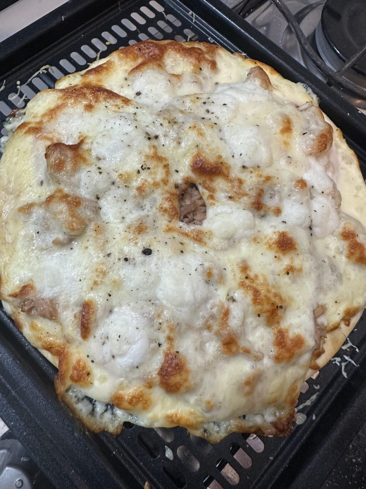 Pizza with tuna, fresh buffalo mozzarella & regular mozzarella. from… Brazil 😅