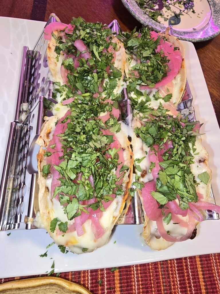 How much of each topping do I want? ALL. Pork baby back ribs braised in homemade salsa. Bring on the comments; I am in too much of a food coma to care.