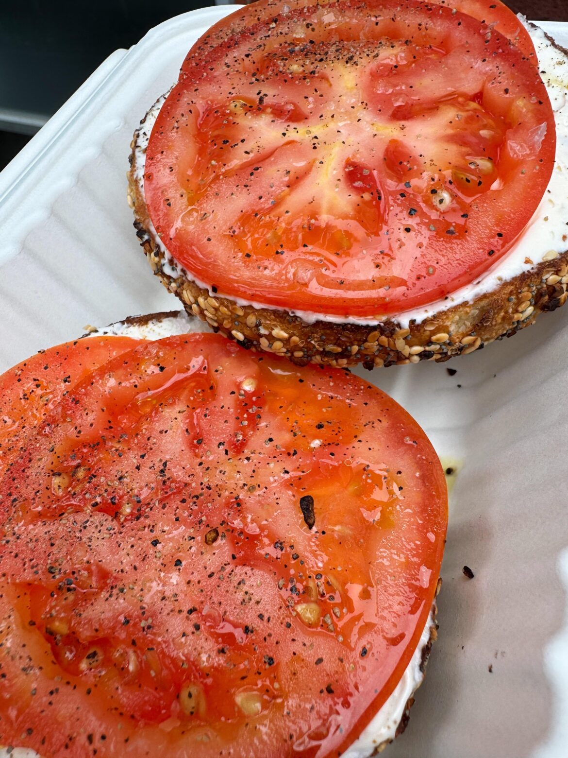 [i ate] everything bagel with plain cream cheese and tomatoes in new york city
