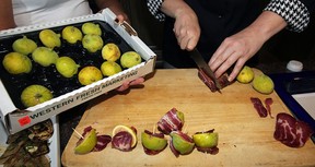 Chef Antonia Maceroni cuts prosciutto and figs. (NICK BRANCACCIO / The Windsor Star)