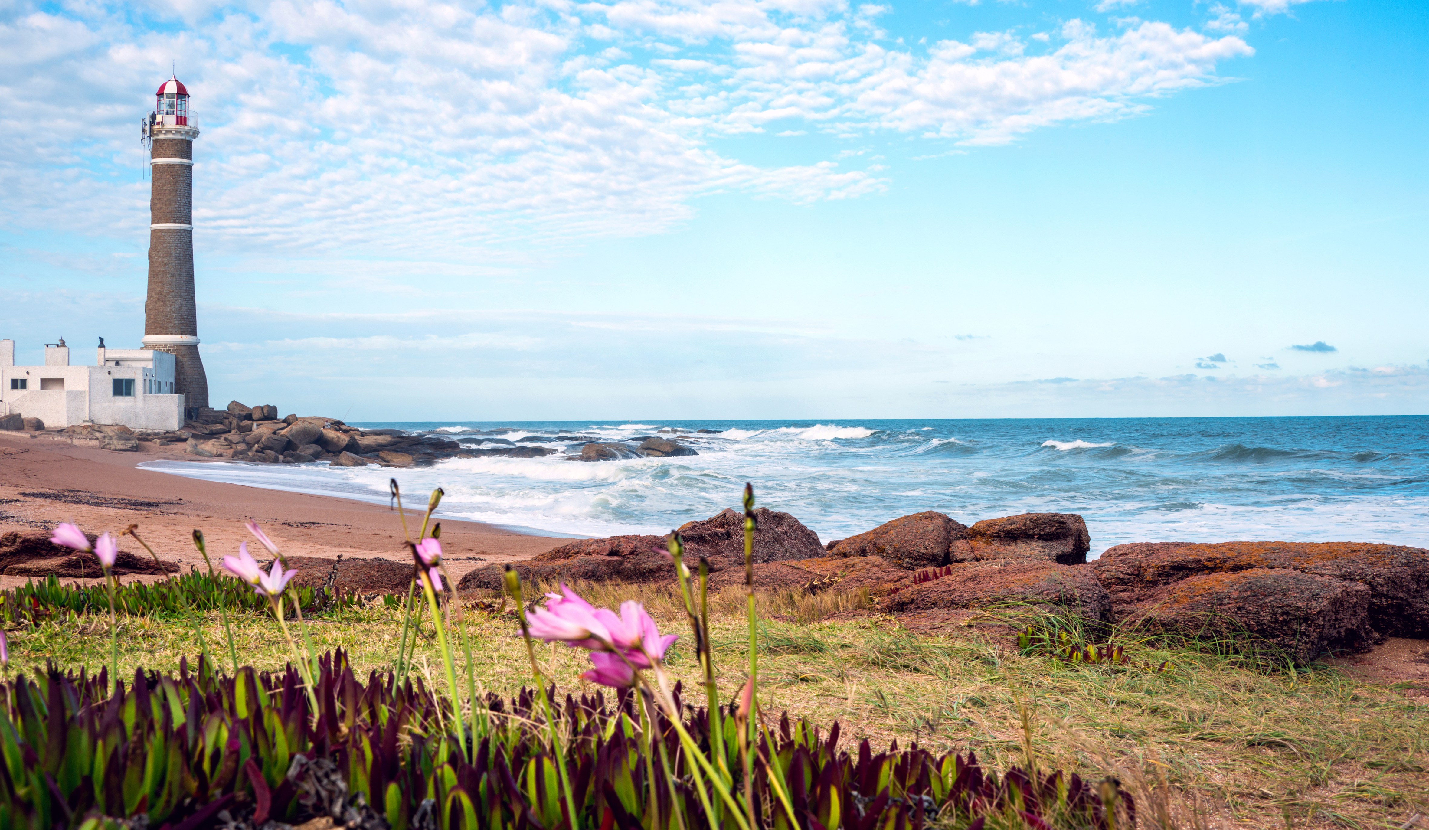Lighthouse on a rocky beach in Jose Ignacio, Uruguay.