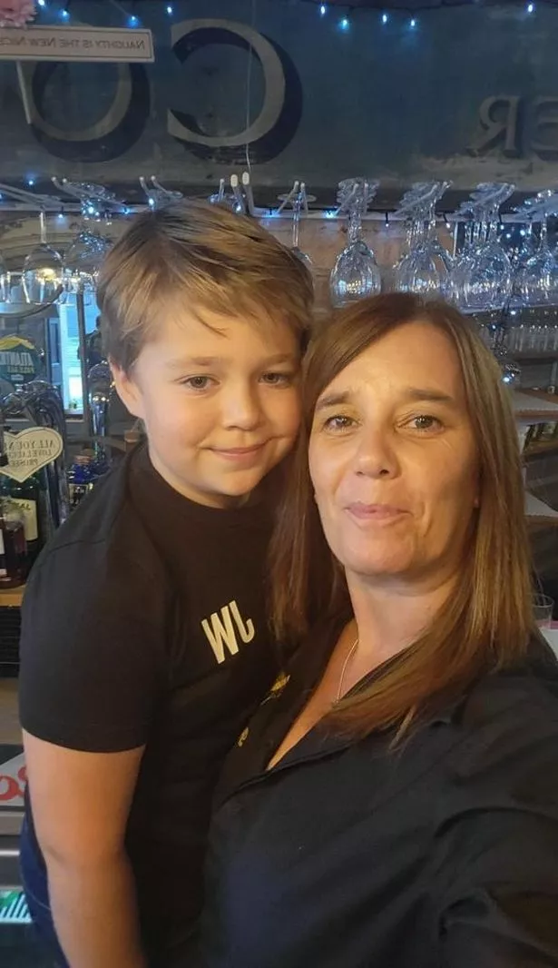 Camille's son Vito with staff member Debs