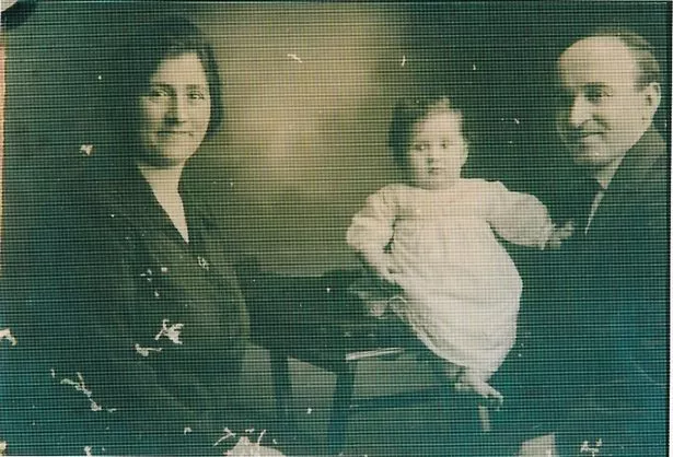Attilio and Maria Conti with their daughter