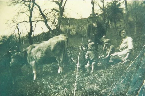 Family portrait of Attilio and Maria Conti with their children on a trip to Italy
