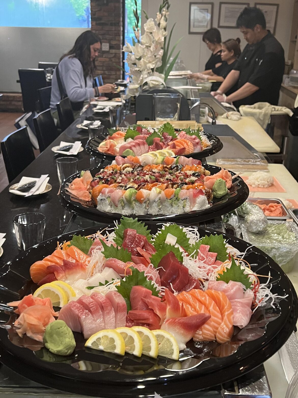 A few platters of rolls and sashimi