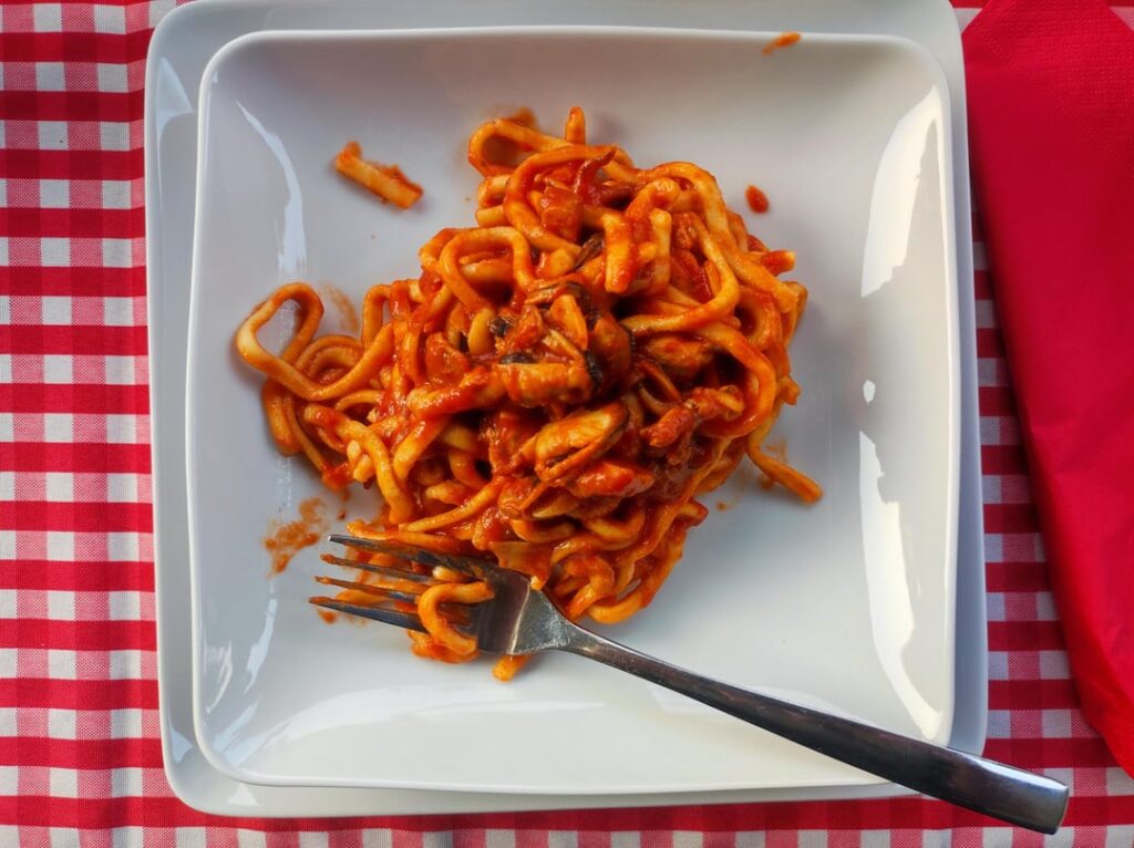 [My Friday dinner] Homemade tagliolini with tomato and mixed fish sauce, octopus with boiled potatoes, celery & shrimp.