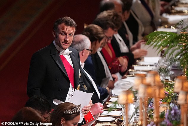 France's President Emmanuel Macron delivers a speech during the banquet at Windsor Castle