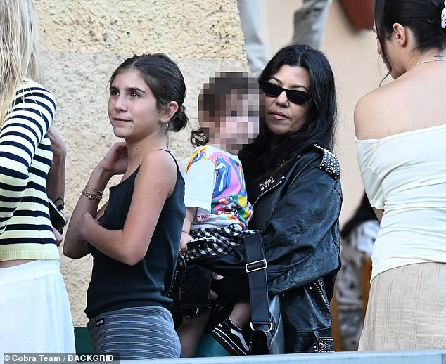 They were also joined by her daughter Penelope, 13, whom she shares with ex Scott Disick, 42