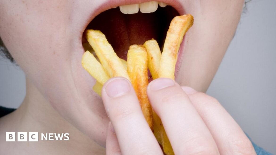 Teenager ‘blind’ from living off crisps and chips person eating chips