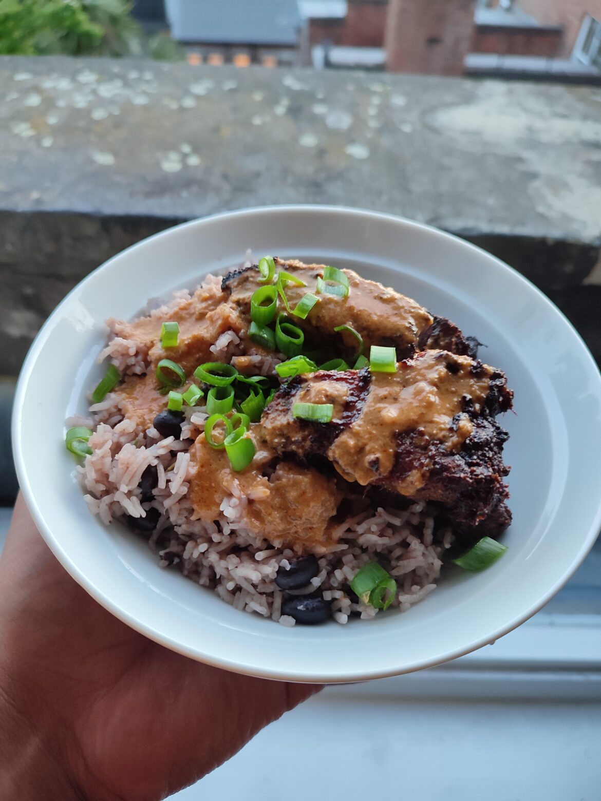 Jerk style air fried pork belly strips, rice and peas x