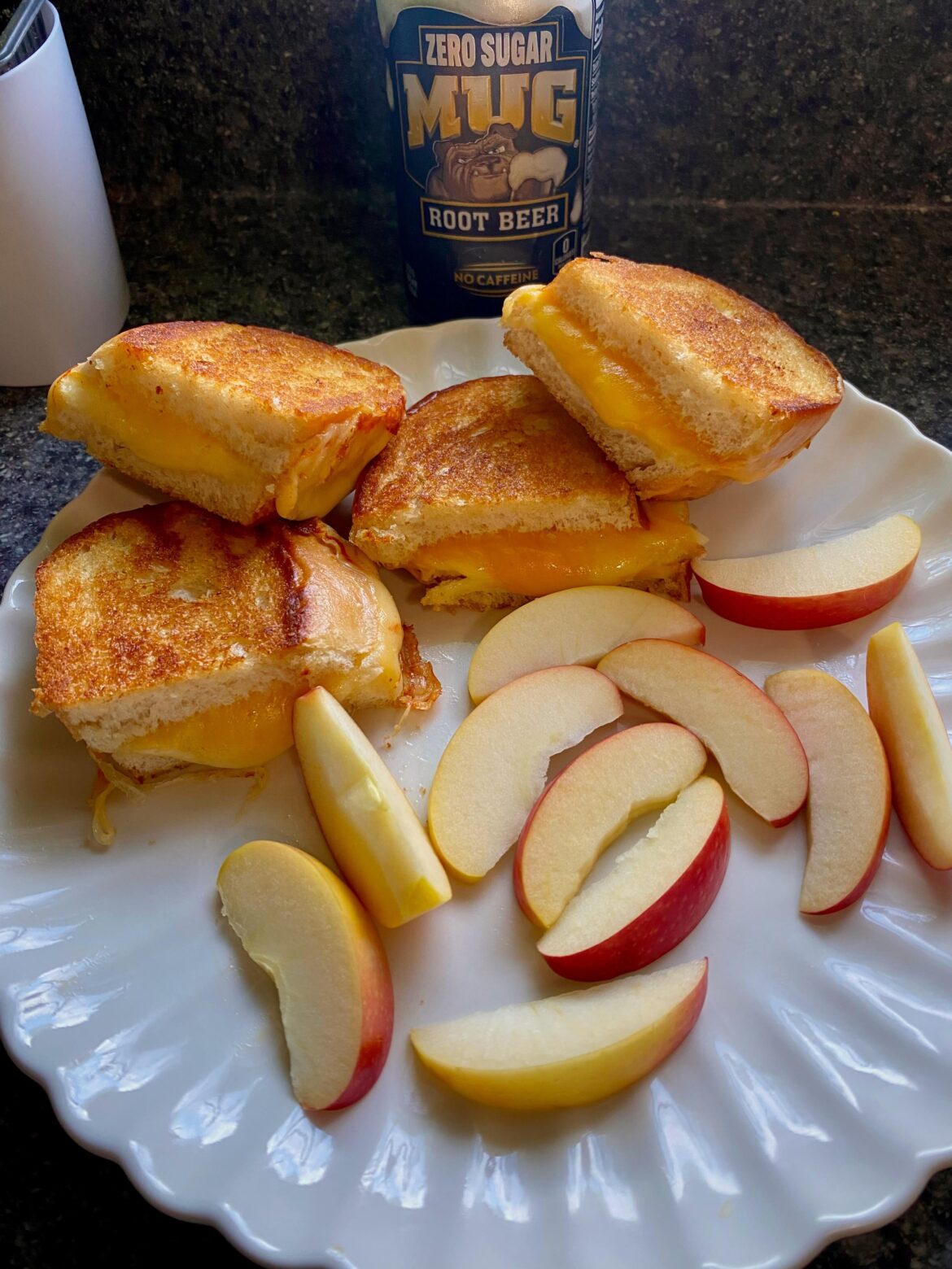 Grilled cheese sandwiches with apple slices 😋 and the worst root beer I’ve ever tasted in my life lol