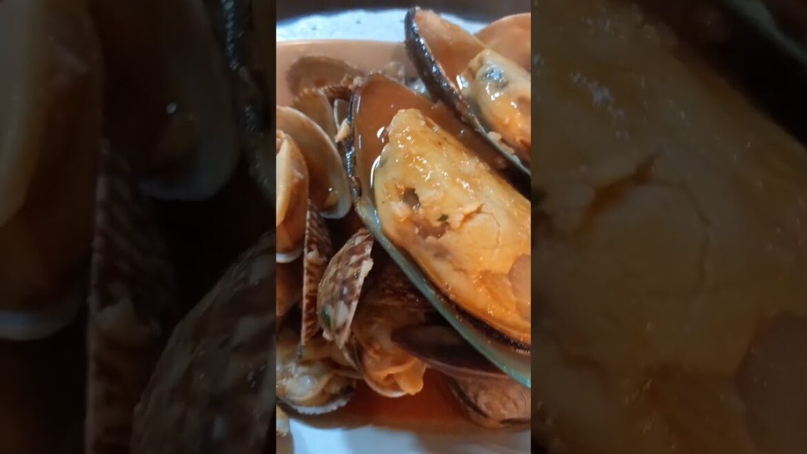 mussels and clams in white wine and tomato sauce italian style