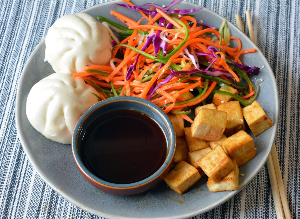 378 cal snack plate with teriyaki bao buns, tofu, pickled salad