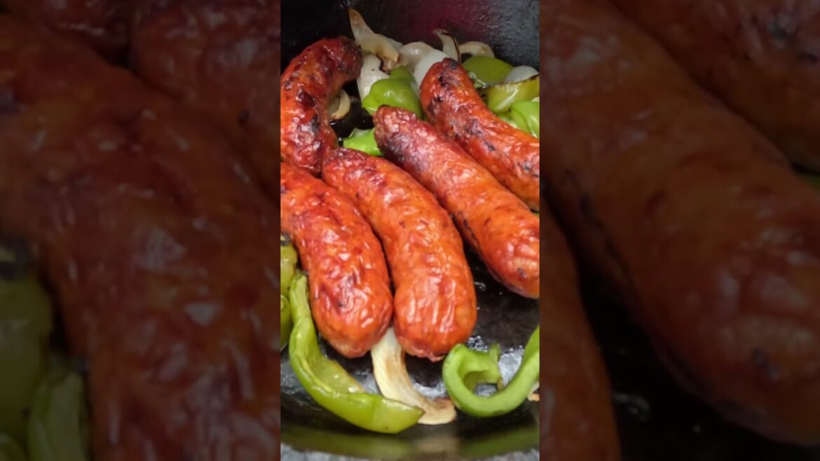 Grilling some sausage onions and green peppers on the gas grill. #getgrilling #cooking #food