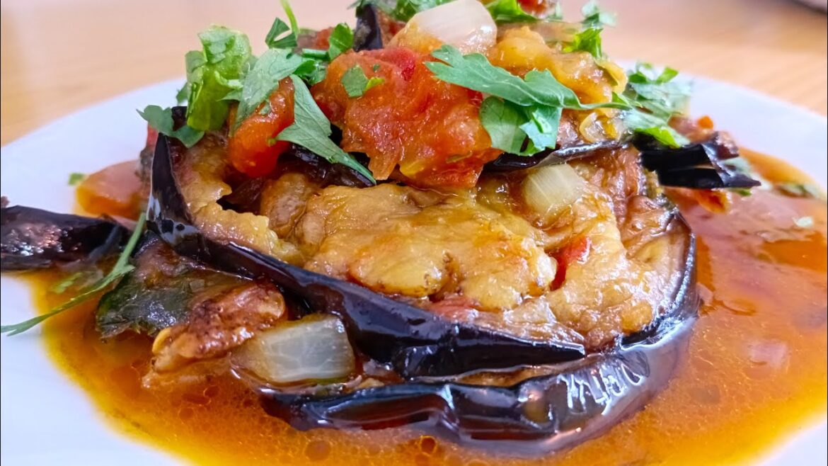 Fried eggplants with tomatoes are a simple and very quick dish with a minimum of ingredients.