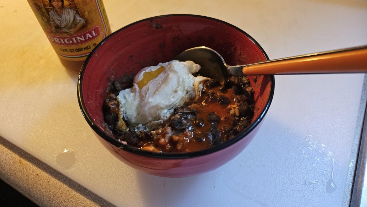 Had a little chicken tinga left. Added some more salsa, and threw some rice in it. Made black beans with some spices and cooked some chunks of pork shoulder in em till slicing easily and some were starting to shred. Last night was tacos. This morning is a bowl with an egg