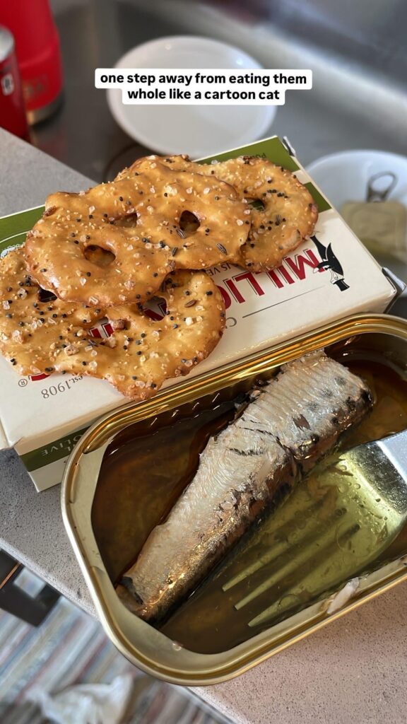 Officially a “sardines over the sink” person.