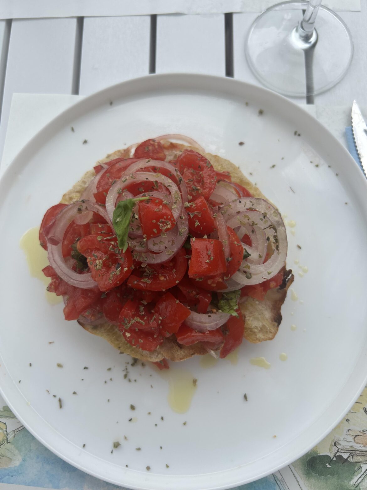 Pani cunzatu (bread with tomatoes and red onion)