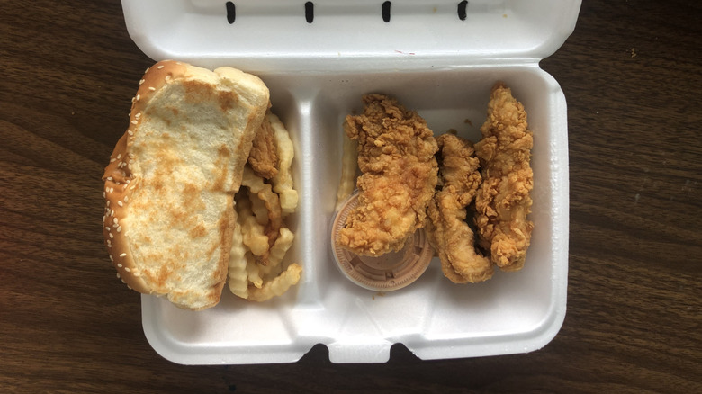 Raising Cane's chicken finger meal in a Styrofoam box