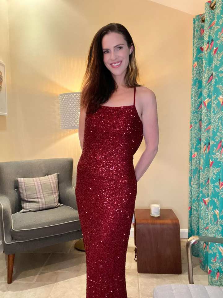 Woman in a sequined red dress.