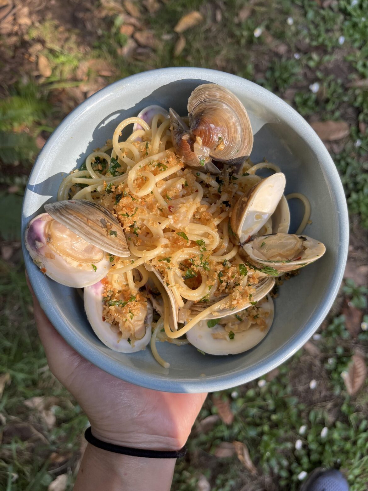 Spaghetti alle vongole cooked over the campfire