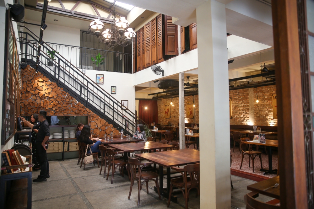 La Risata in Ampang brings Italian home vibes with its magnificent courtyard in the middle of the restaurant. — Picture by Choo Choy May
