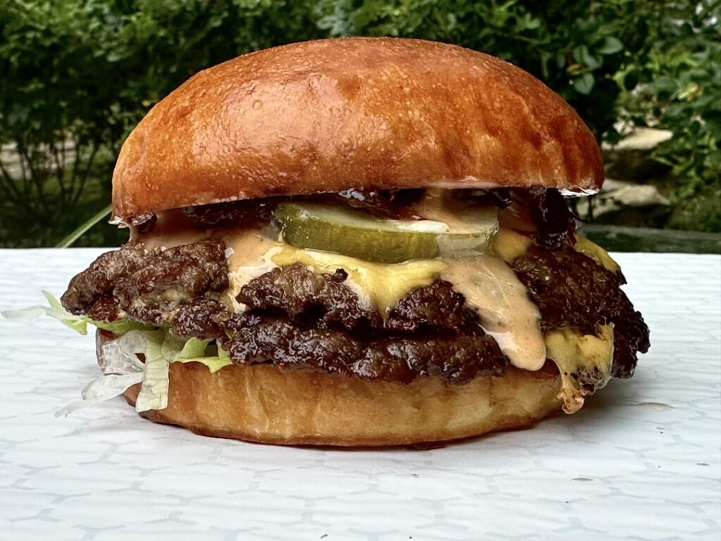 Homemade smash burger with red onion jam