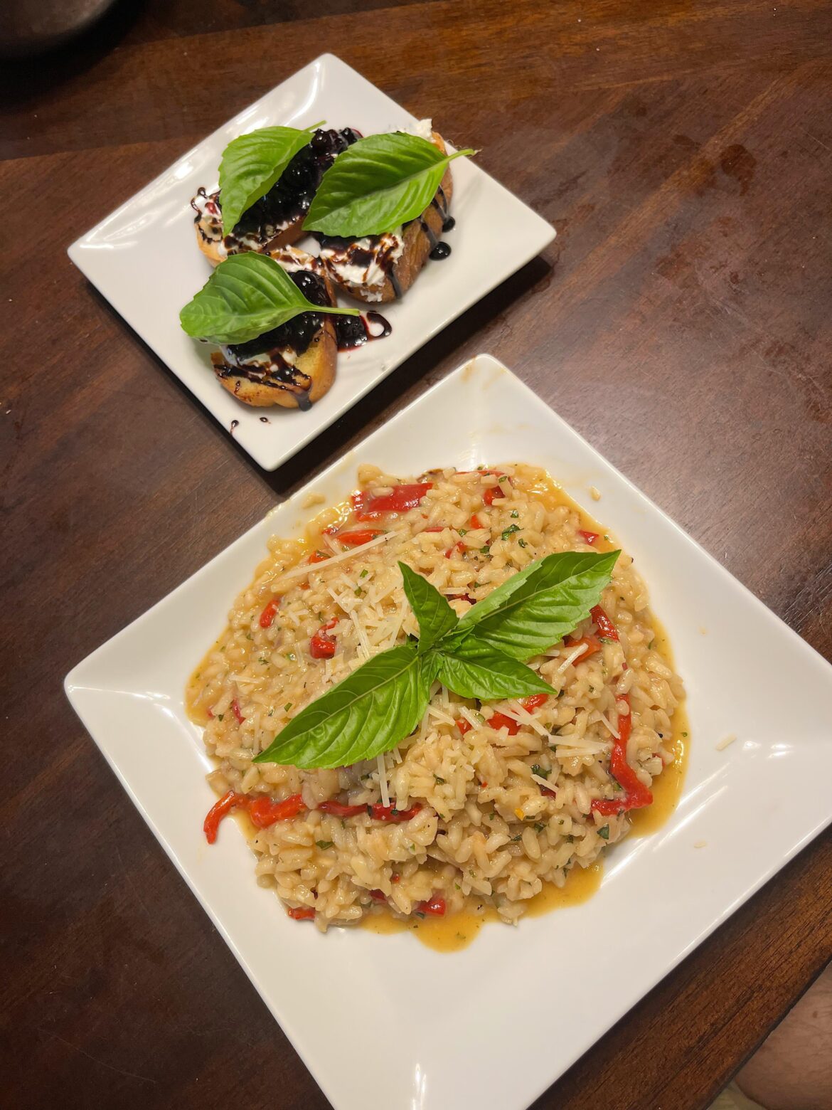 Roasted Red Pepper Risotto with Fresh Basil. Served with Garlic Crostini with Whipped Goat Cheese, Blueberry Compote, Balsamic Vinegar reduction, and Fresh Basil.