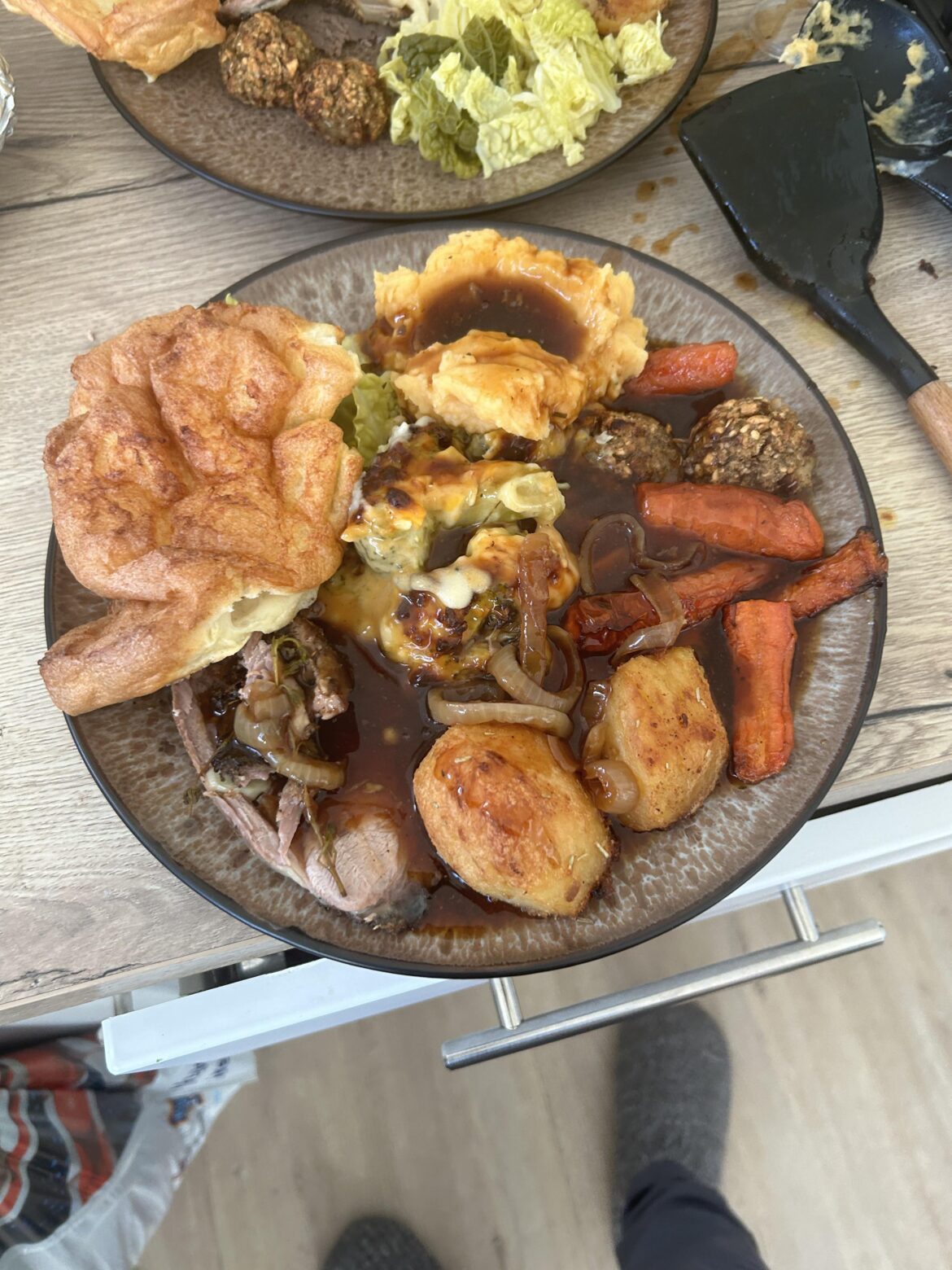 Minted roast lamb, sweet potato mash, roasted potatoes in clotted cream and rosemary garlic salt, roast carrots ,  cauliflower broccoli cheese, sage stuffing and Yorkshire pudding with minted onion gravy