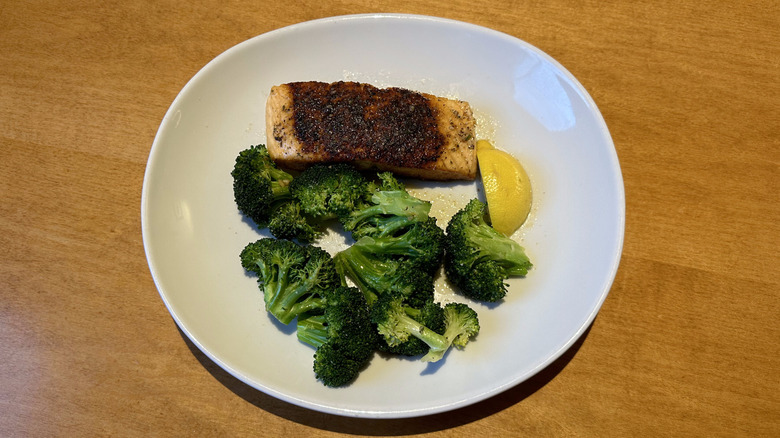 Olive Garden herb-grilled salmon on white plate