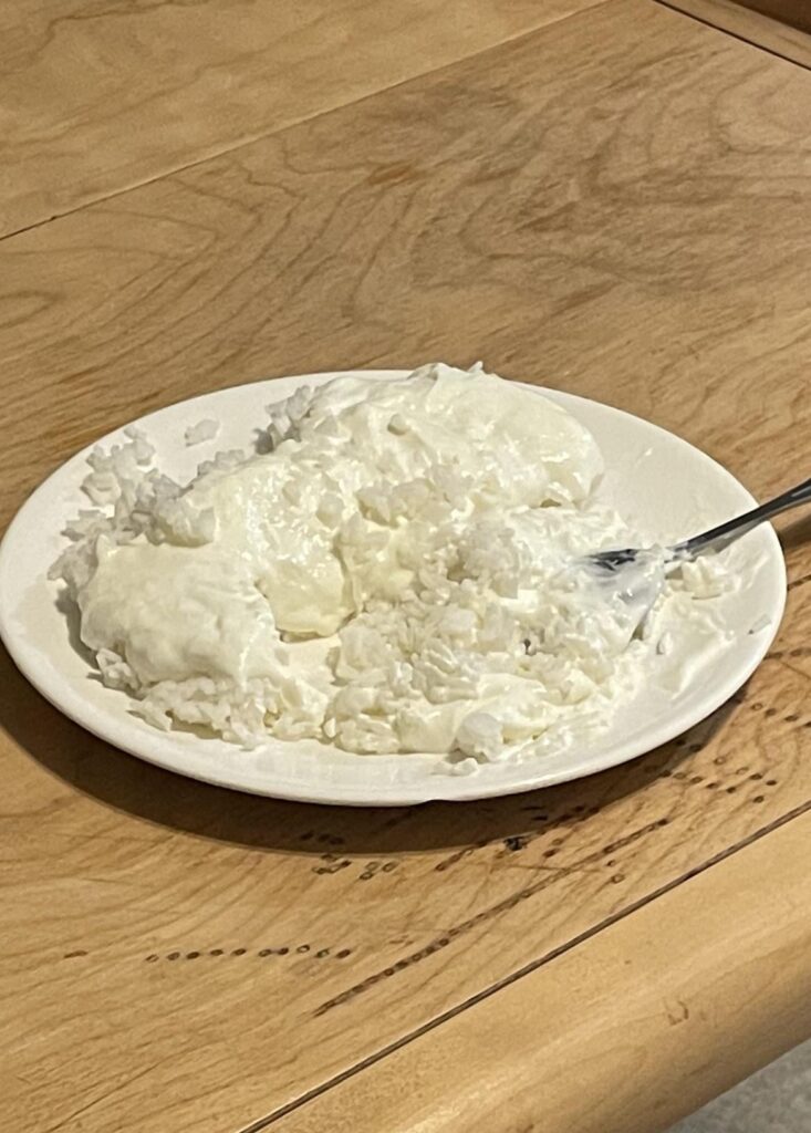 Roommate eats plain white rice with a ridiculous amount of miracle whip