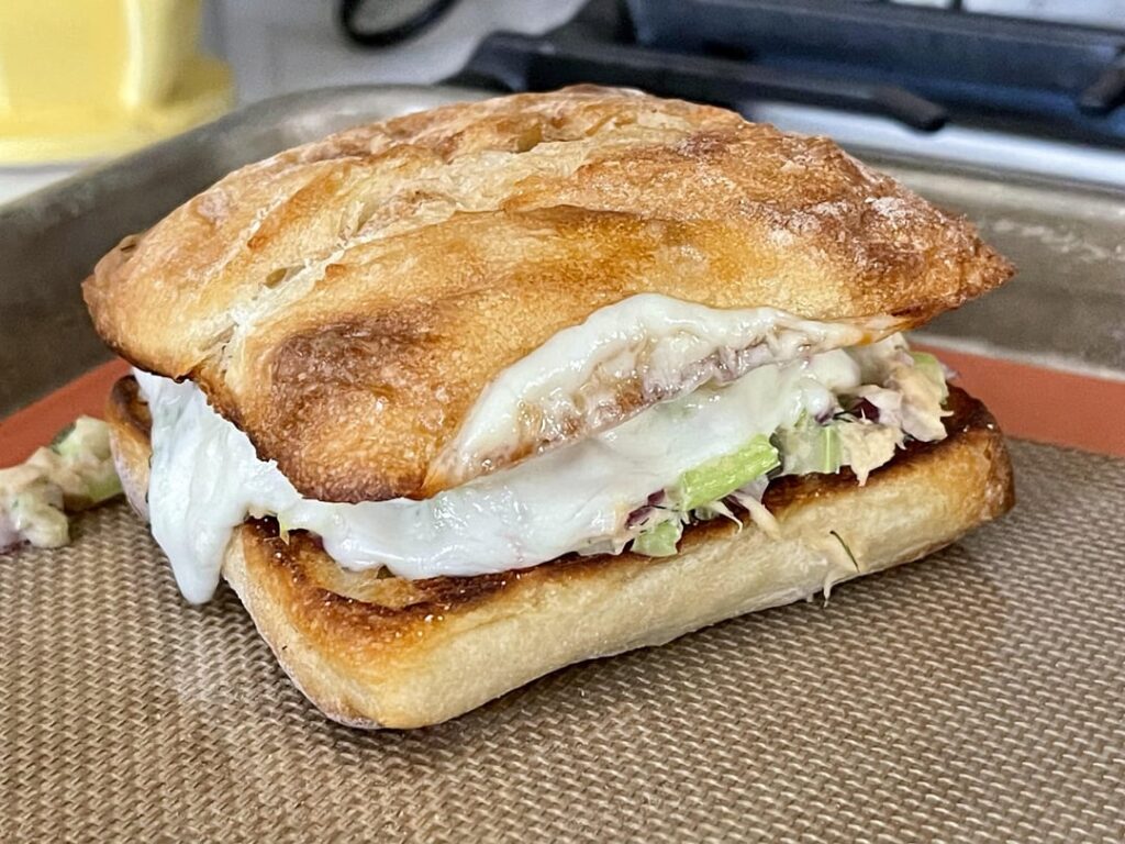 Tuna salad, mozzarella, on butter toasted ciabatta
