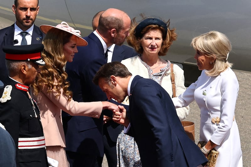 France's President Emmanuel Macron seems to get on better with Kate than he did with his wife, Brigitte, upon arrival at RAF Northolt, west of London, on July 8, 2025, on the first day of a three-day state visit to Britain.