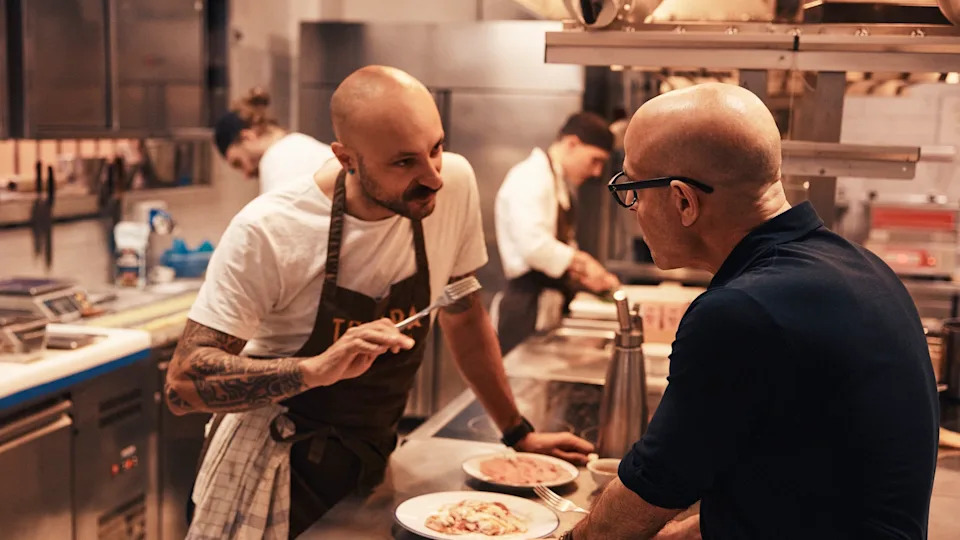  Trippa chef and Stanley Tucci in the kitchen in Tucci in Italy. 