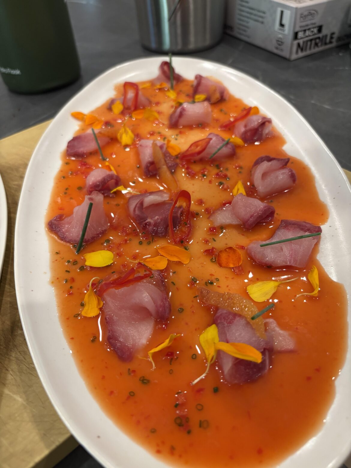Hamachi crudo with blood orange and fresno brodo
