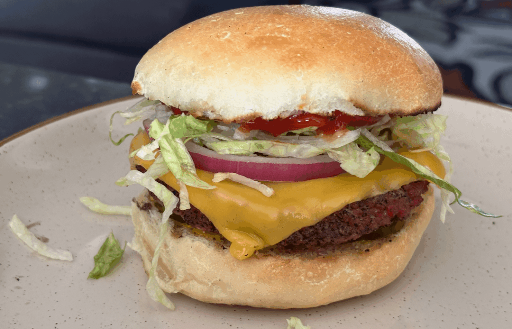Smoked, grass-fed ground chuck burger on homemade buns… Smoked, grass-fed ground chuck burger on homemade buns...
