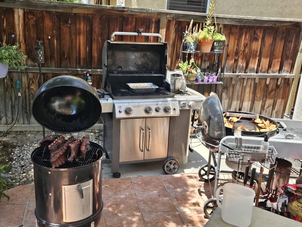 Never let the wife tell you you have too many grills. 3 of them going for the 4th!