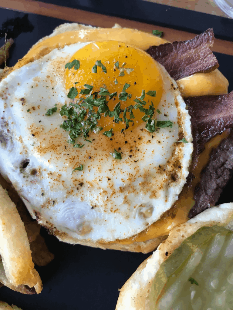 Bacon burger + flawless egg = breakfast goals