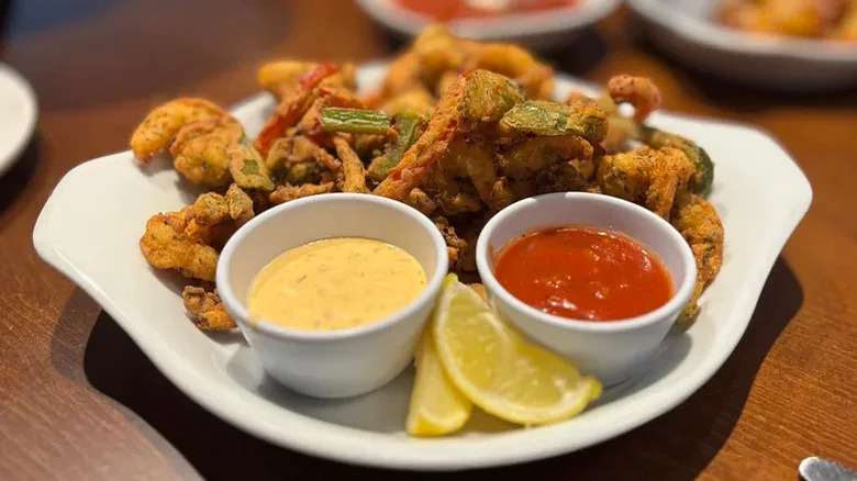 Fried pieces of food with dip