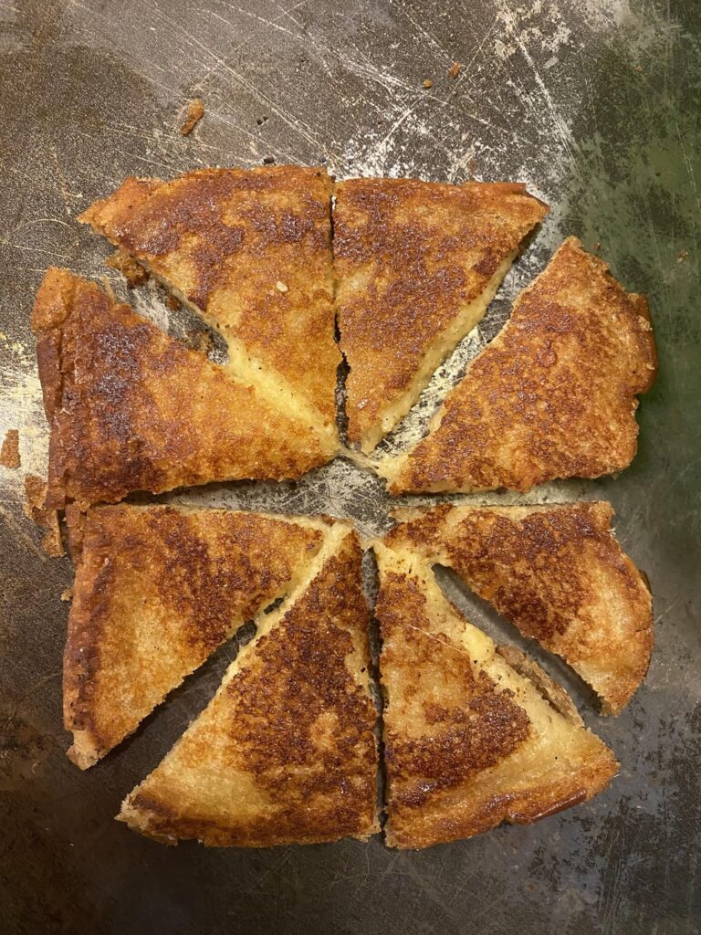Gouda and sharp cheddar (Cabot, shredded) with Tillamook butter. Tossed in chicken noodle soup