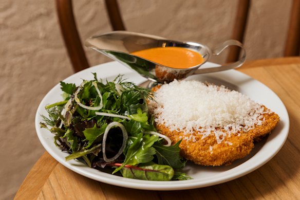 Chicken schnitzel with parmesan and vodka-tomato sauce 