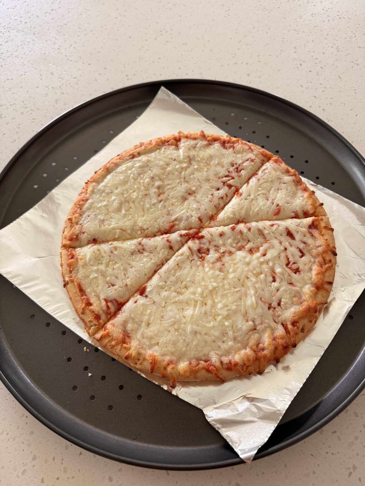 My wife cuts a pizza by eyeballing the size of the slice rather than making a + and then cutting diagonally through it.
