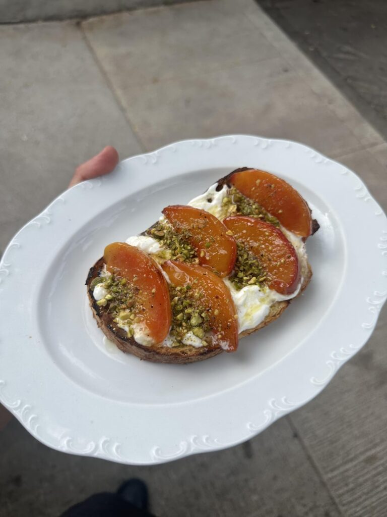 Amaro braised Ontario peach, burrata, smoked pistachio crumble, olive oil, sourdough