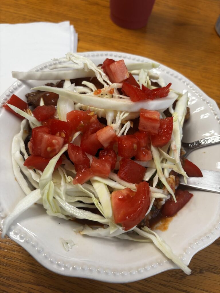 Roasted chicken with cilantro lime rice, spicy seasoned black beans and homemade enchilada sauce