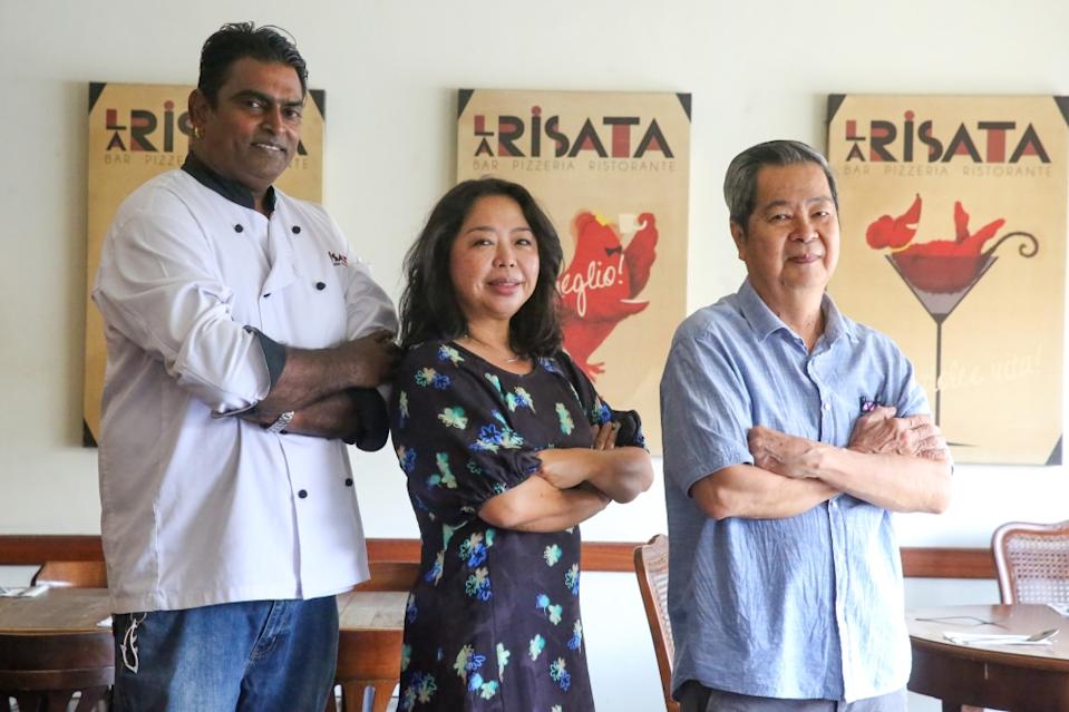 La Risata owner Lissa Yeoh (middle) with her faithful chefs Kumar Karu (left) who is the present ‘chef de cuisine’ and Ho Chee Ming (right) who steered the restaurant for many years until his recent retirement. — Picture by Choo Choy May