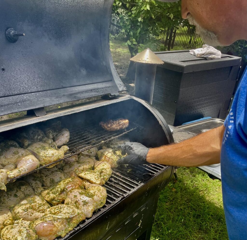 While he did Jerk Chicken, I grilled the New York steaks for carving!