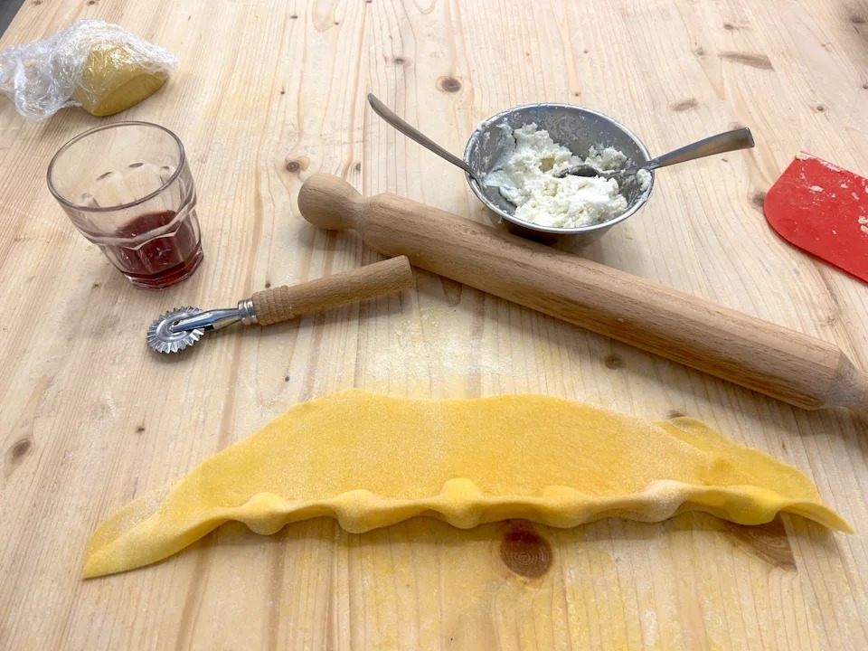 Making homemade pasta at Florence pasta class